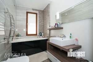 Коттедж 370м&sup2;, 3-этажный, участок 15 сот.  